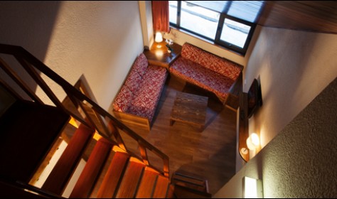 Habitación Duplex: dos plantaas comunicadas por una escalera de madera